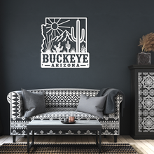 Load image into Gallery viewer, Buckeye_Roots_Metal_Sign__Arizona_Deser_White_Dark_Living_Room_Mockup.png_15881284