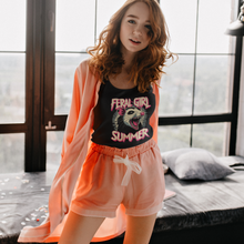 Load image into Gallery viewer, Unleash Your Wild Side with the 'Feral Girl Summer' Tank on a red-headed woman in a NY penthouse.