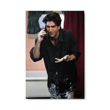 Load image into Gallery viewer, Ross in black shirt with white paint on pants talking on phone in bathroom