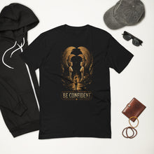 Load image into Gallery viewer, Black t-shirt with 'Be Confident' graphic, hoodie, cap, sunglasses, and wallet on a white background