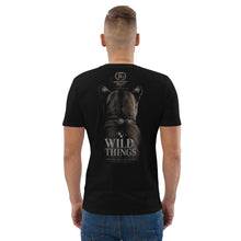Load image into Gallery viewer, Person wearing a Mountain Lion Turquoise Jewelry Organic Cotton Tee on the back, standing against a white background.
