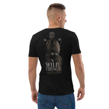 Load image into Gallery viewer, Man wearing a Mountain Lion Turquoise Jewelry Organic Cotton Tee and text on the back, on a white background.