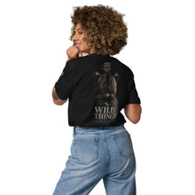 Load image into Gallery viewer, Person wearing a Mountain Lion Turquoise Jewelry Organic Cotton Tee the back, standing against a white background.