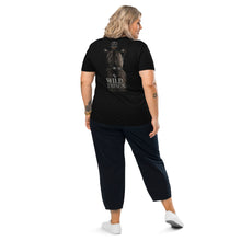 Load image into Gallery viewer, Person wearing a Mountain Lion Turquoise Jewelry Organic Cotton Tee (back), standing against a white background.