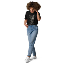 Load image into Gallery viewer, Person wearing a Mountain Lion Turquoise Jewelry Organic Cotton Tee, light blue jeans, and white sneakers on a white background