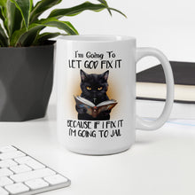 Load image into Gallery viewer, Im-going-to-let-god-fix-it-cat-mug-by-vtown-designs-dot-com-white-mug-by-the-laptop