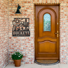 Load image into Gallery viewer, Buckeye_Roots_Metal_Sign__Arizona_Deser_Black_Brick_Entrance_Mockup.png_15881278
