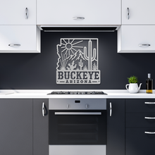 Load image into Gallery viewer, Buckeye_Roots_Metal_Sign__Arizona_Deser_Silver_Dark_Kitchen_Mockup.png_15881290
