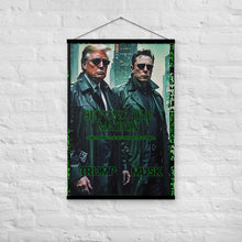 Load image into Gallery viewer, 24x36 Beyond the Matrix Poster - Trump &amp; Musk: Shatter Power Illusions [Hanging on white, brick wall]
