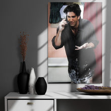 Load image into Gallery viewer, Framed picture of a man on a phone call on a shelf with decorative items.
