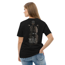 Load image into Gallery viewer, Person wearing a Mountain Lion Turquoise Jewelry Organic Cotton Tee, standing against a white background. Back of Tee
