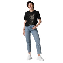 Load image into Gallery viewer, Person wearing a Mountain Lion Turquoise Jewelry Organic Cotton Tee and light blue jeans on a white background
