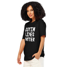 Load image into Gallery viewer, Woman wearing a black t-shirt with white text on a white background
