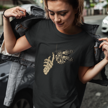 Load image into Gallery viewer, Young woman opening jacket to reveal a black T-shirt with a butterfly and skull design by VTown Designs 
