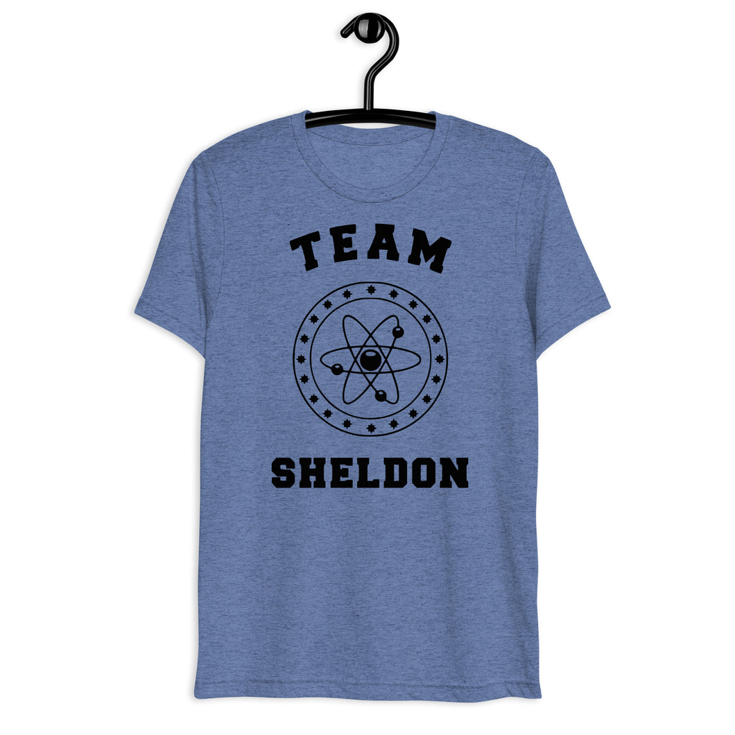 Team Sheldon Bazinga T-Shirt for Fans of The Big Bang Theory Blue on a hanger
